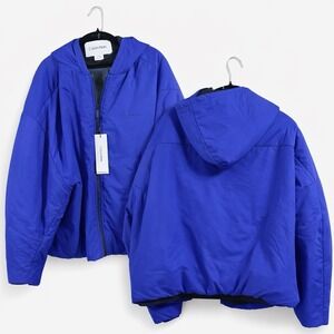 vibrant blue jacket is a Calvin Klein water-resistant puffer. XL